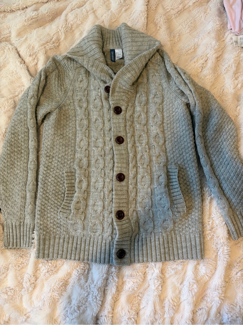 collared, light grey cable-knit cardigan